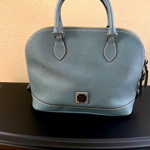 Army green Dooney and Burke purse. Brand new. It’s never been used.